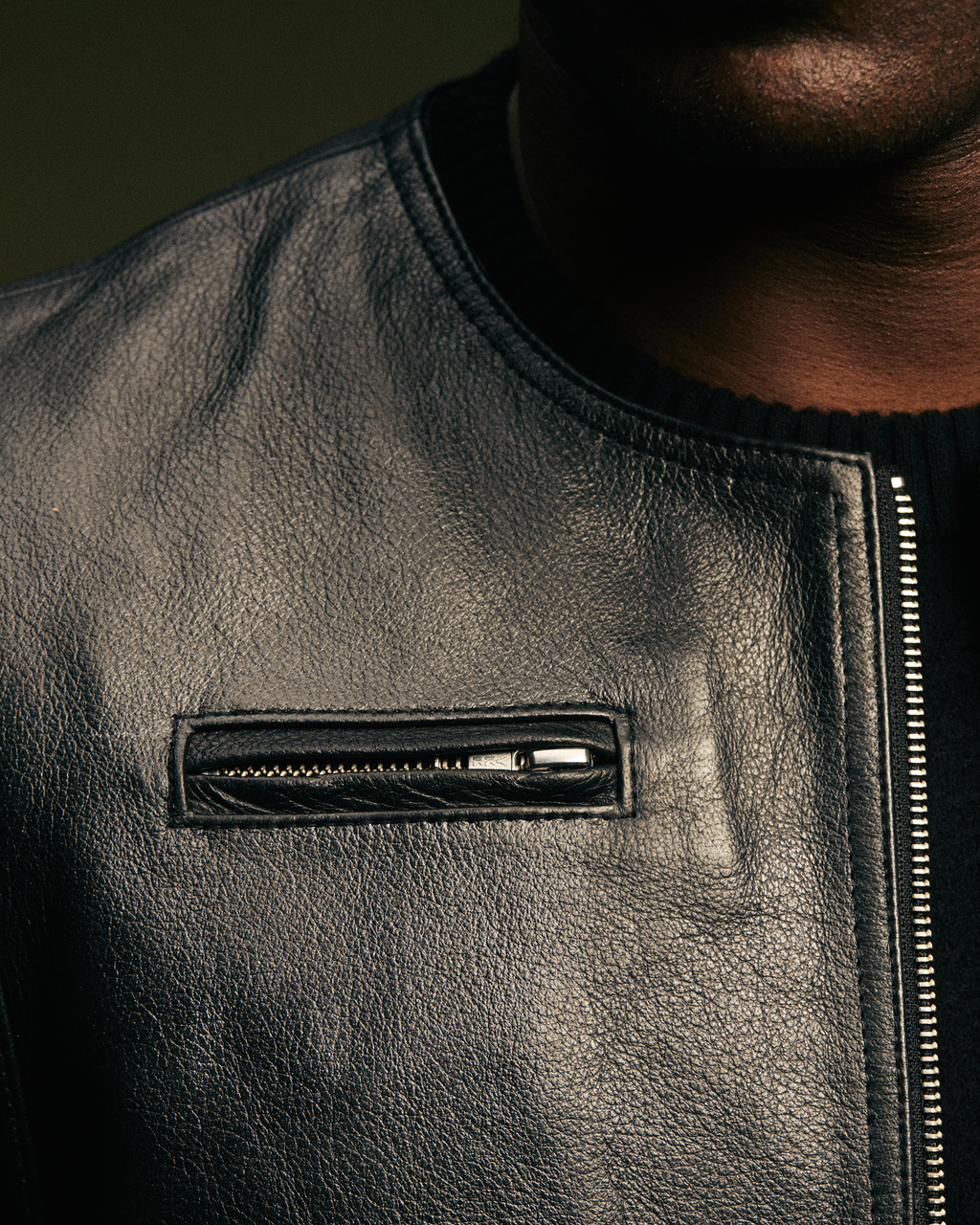 SLEEVELESS LEATHER JACKET - COMMUNITY